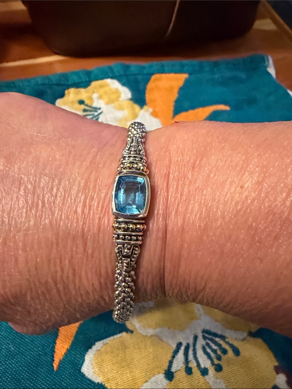 Lagos bracelet with blue gem.
